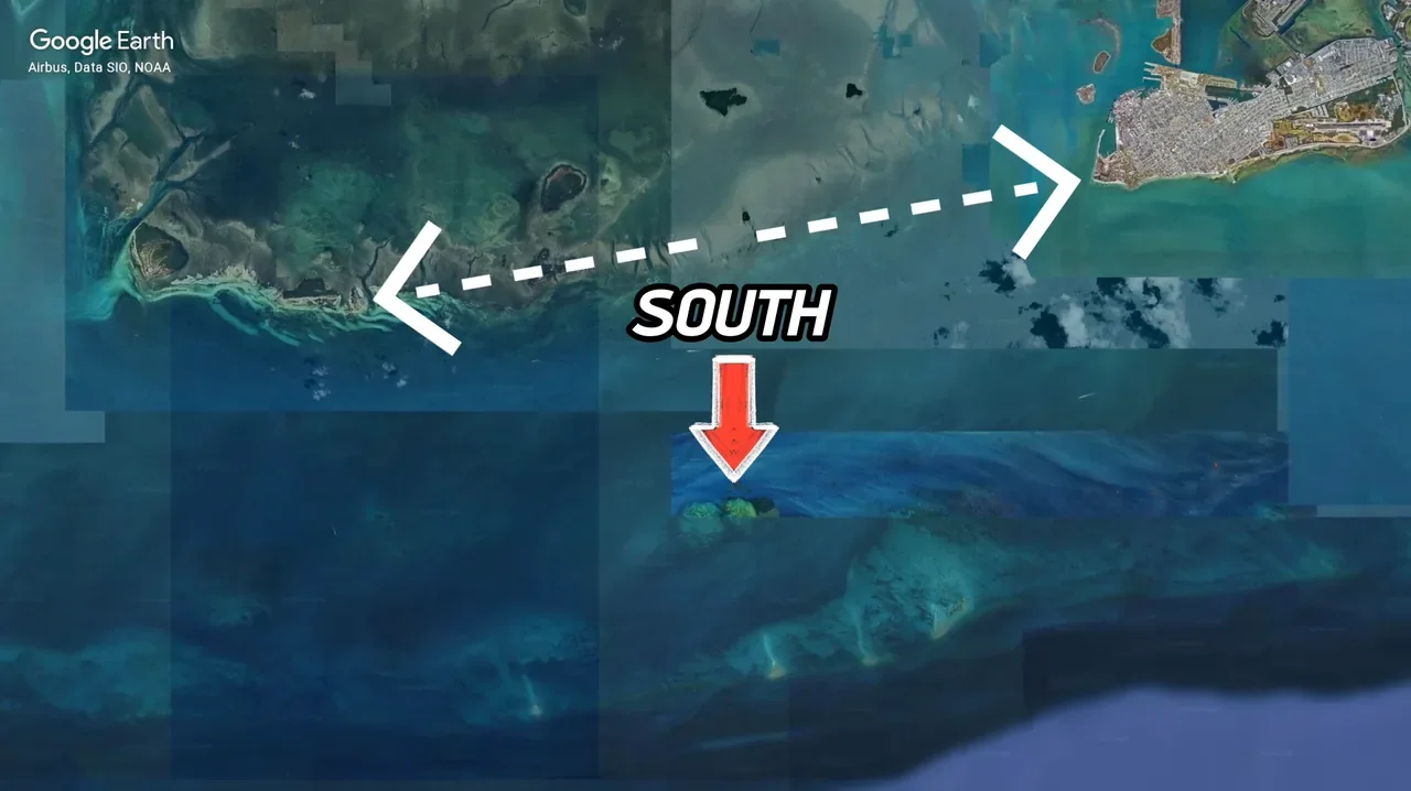The dotted line runs from Ballast Key (left) to Key West (right). The red arrow points to somewhere even farther south. Map: Google Earth / Airbus, Data SIO, NOAA